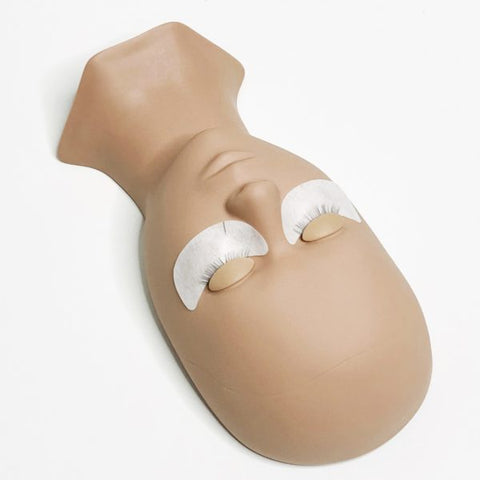Mannequin head with eye pads for lash practice